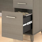 Bureau en L avec tiroirs et rangement, coloris gris cendré / gris tempête / blanc / noyer / chêne