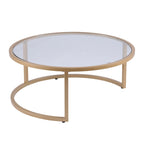 Table basse gigogne ronde à plateau en verre et piètement doré, lot de 2